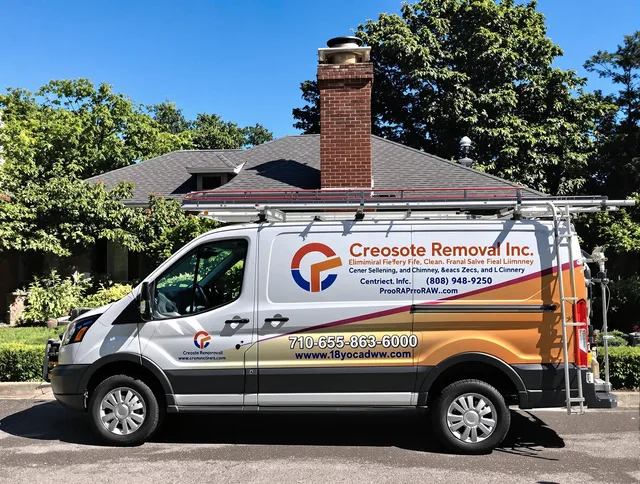 Manchester Chimney Sweep technician removing creosote safely in Manchester, CT