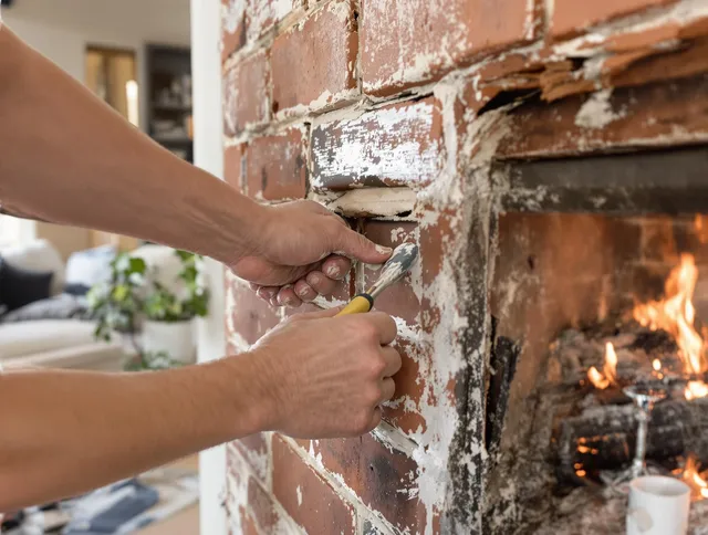 Routine fireplace repair by Manchester Chimney Sweep in Manchester, CT